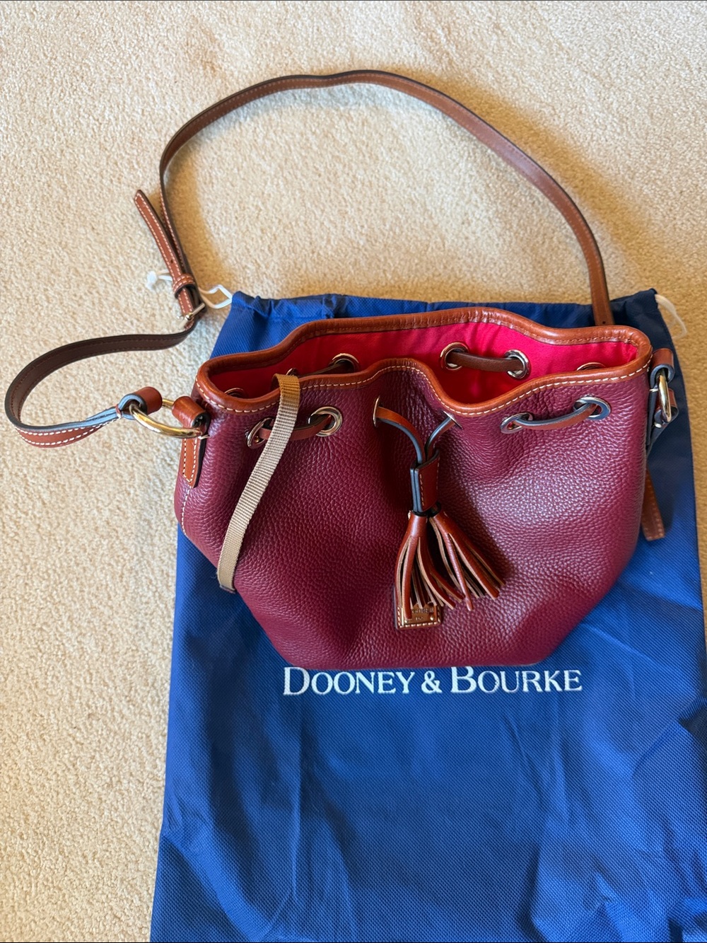 Dooney & Bourke Wine Red Pebble Grain Kendall  Leather Drawstring Shoulder Bag
